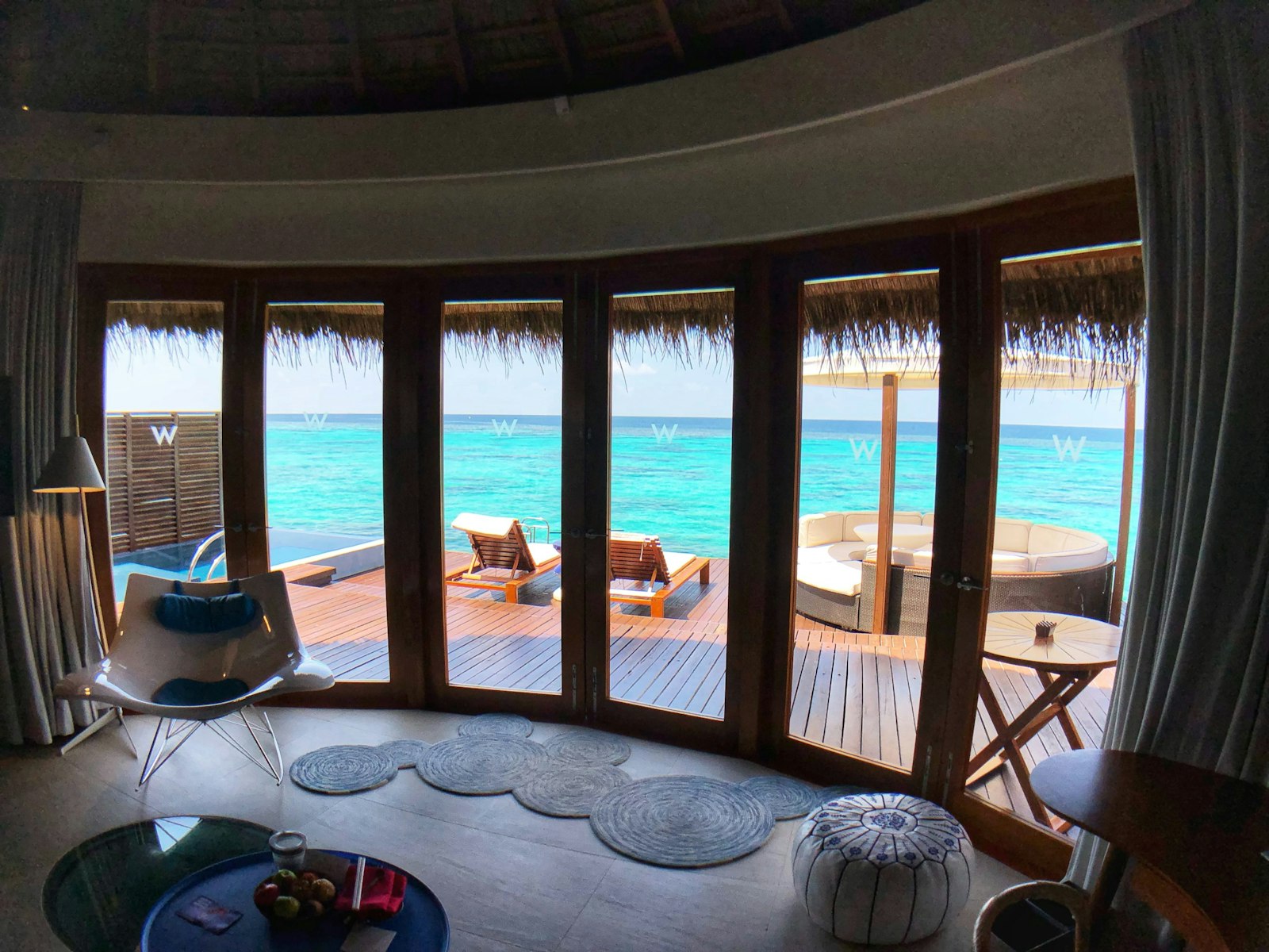 An overwater suite opening to the lagoon
